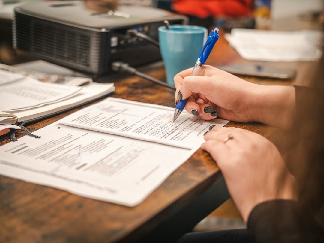 people filling out survey forms